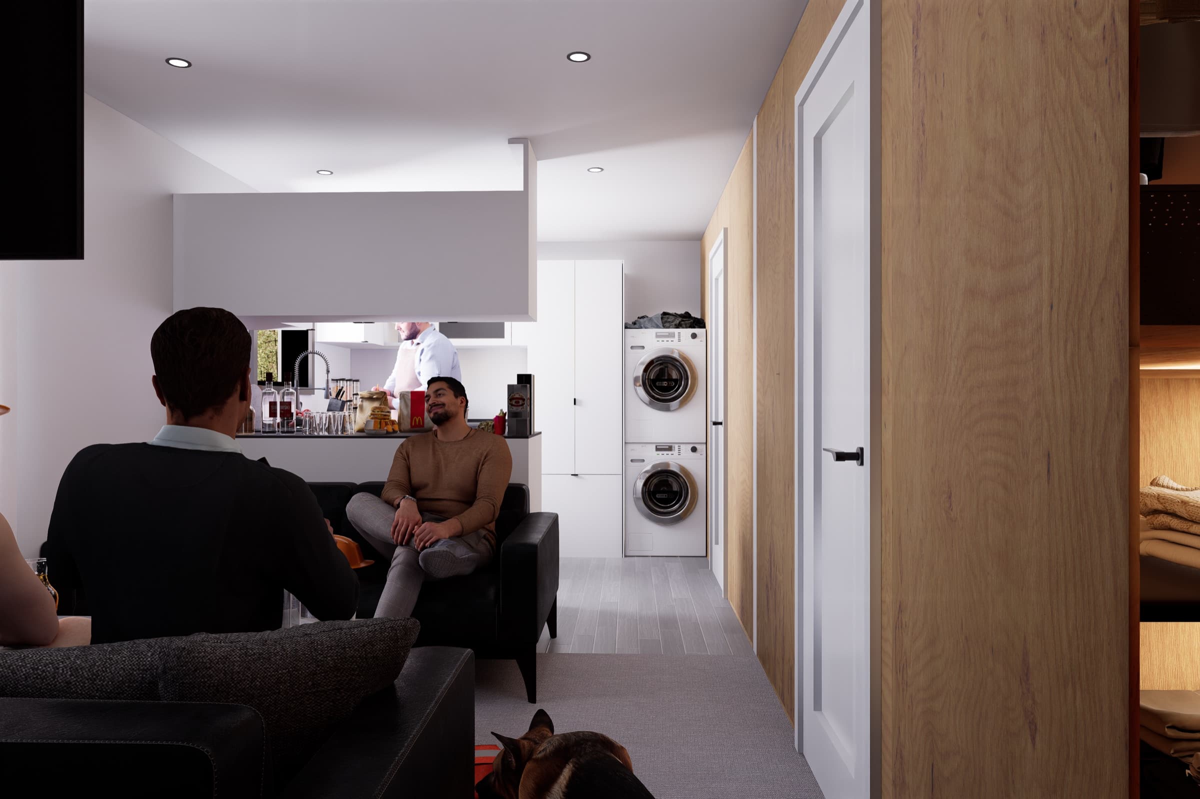 View from the living room toward the in-unit stacked washer and dryer